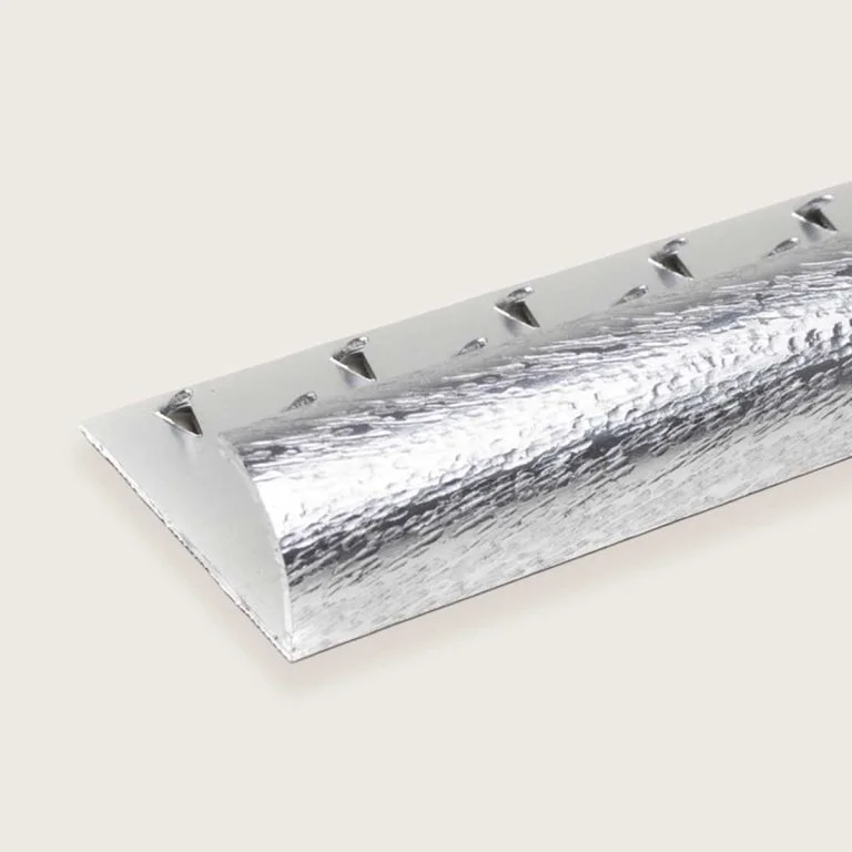 Tapijtaflsuitrand, een profiel om het tapijt mee af te sluiten